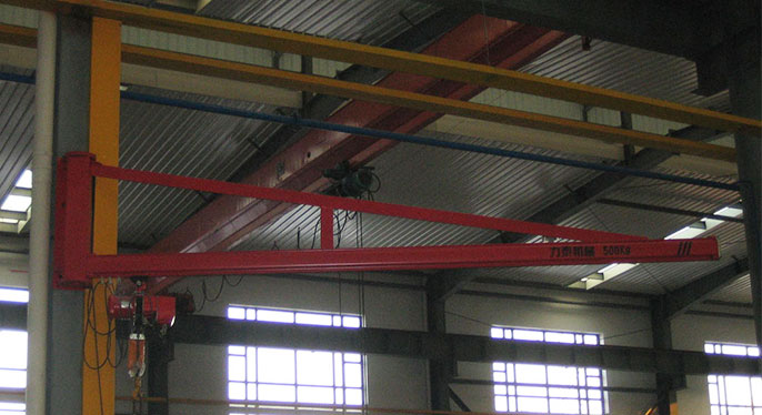 Wall travelling jib crane